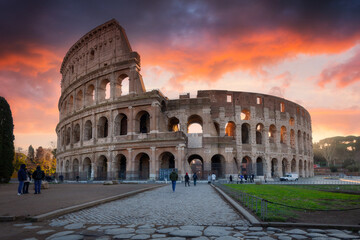 Fototapeta premium The Colosseum in Rome at sunrise, Italy