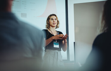 Entrepreneur discussing business ideas in a conference