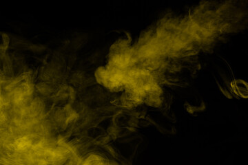 Yellow steam on a black background.
