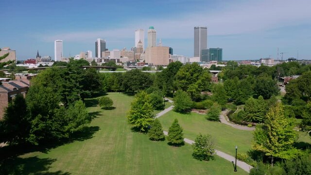 Elevating up over the outskirts of Tulsa Oklahoma near the Arkansas River