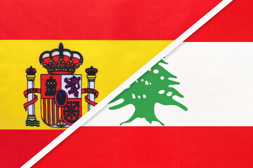 Fototapeta premium Spain and Lebanon, symbol of two national flags from textile. Partnership between European and Asian countries.