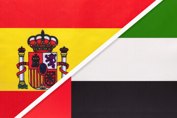 Spain and United Arab Emirates or UAE, symbol of two national flags from textile. Partnership between countries.