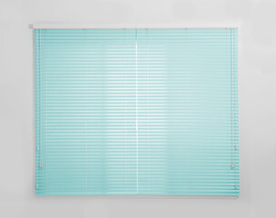 Window with closed turquoise blinds in room