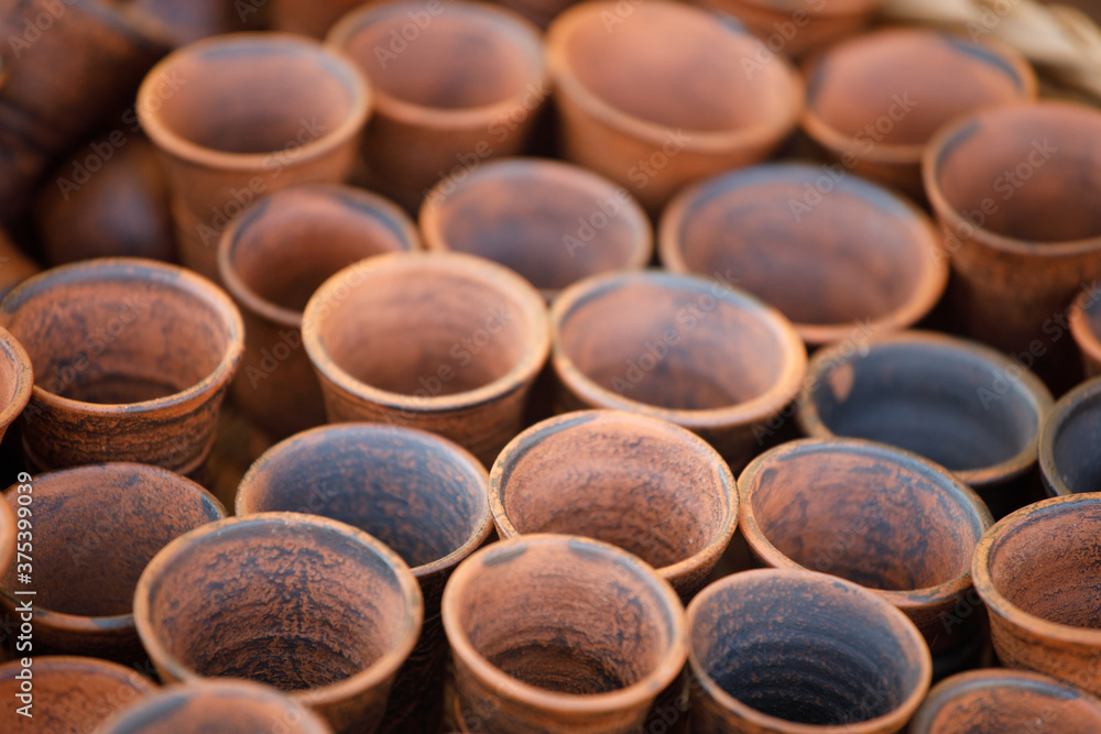 Poster clay pots are in rows. view from above