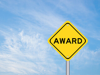 Yellow transportation sign with word award on blue sky background