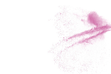 Freeze motion of pink color powder exploding on white  background. 