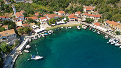 Fototapeta na wymiar Aerial drone photo of picturesque beautiful seaside village of Kioni a safe anchorage for yachts and sail boats, a true gem of Ithaki or Ithaca island, Ionian, Greece