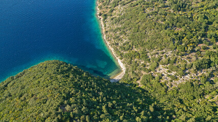 Aerial drone photo of picturesque beautiful seaside village of Kioni a safe anchorage for yachts...