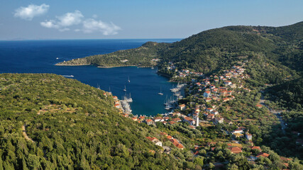 Fototapeta na wymiar Aerial drone photo of picturesque beautiful seaside village of Kioni a safe anchorage for yachts and sail boats, a true gem of Ithaki or Ithaca island, Ionian, Greece
