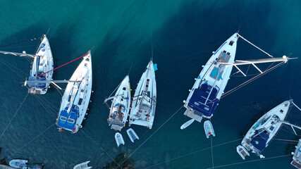 Aerial drone photo of picturesque beautiful seaside village of Kioni a safe anchorage for yachts...
