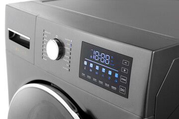 Details of digital display and washing machine volume on white background