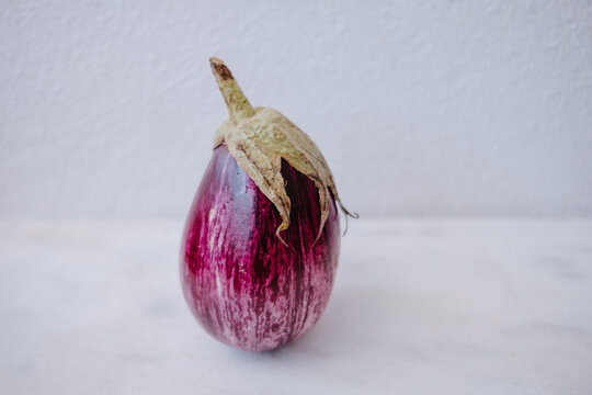 Eggplant on a white marble  table