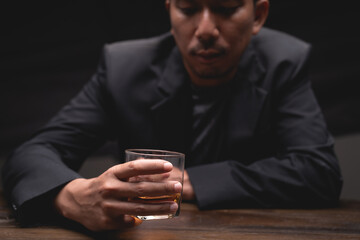 A man who drinks a stressful pose Stress concept