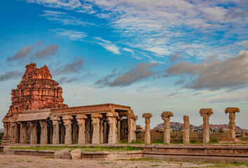 vithala temple hampi ruins antique stone art from unique angle with amazing blue sky