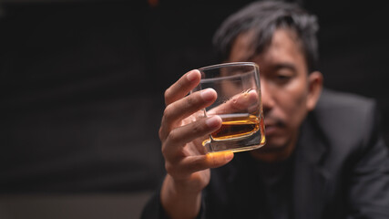 A man who drinks a stressful pose Stress concept