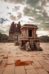 vithala temple hampi ruins antique stone art from unique angle with amazing blue sky