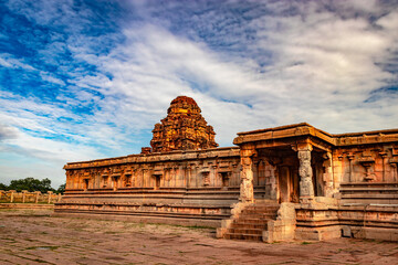 vithala temple hampi ruins antique stone art from unique angle with amazing blue sky