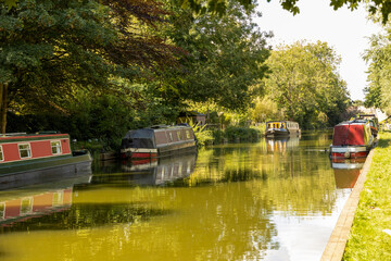 Narrow boats on the Kennet and Avon canal in Southern England. Kintbury.