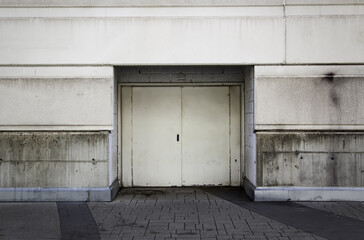 Obraz na płótnie Canvas Metal door in a warehouse