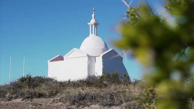 Fuerte San Jose Chapel In Valdes Peninsula, UNESCO World Heritage Site In Patagonia, Argentina - Small White Church Situated In The Middle Of The Desert Near The Isla de Los Pajaros. - reveal shot
