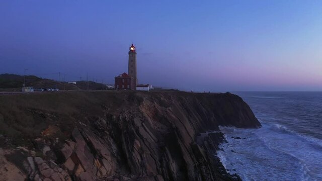 Portugal, lighthouse blue hour aerial pano left to right.