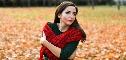 knitted red scarf on the girl