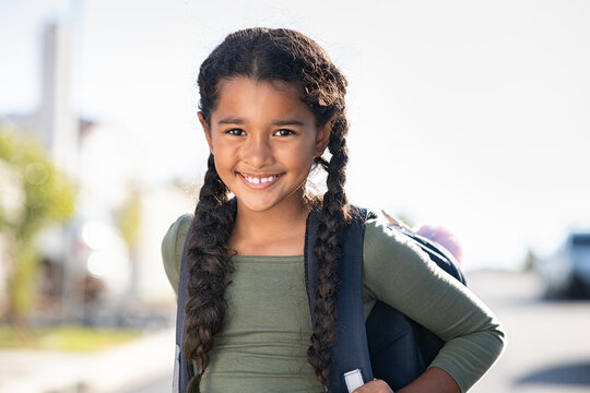 Smiling Elementary School Girl With Bagpack