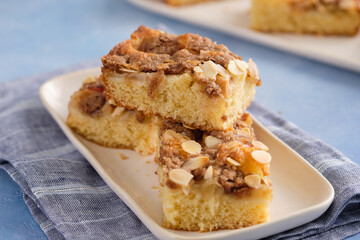 Piece of apple pie with almonds. Copy space.