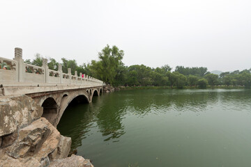 Fototapeta na wymiar stone bridge above the rivers