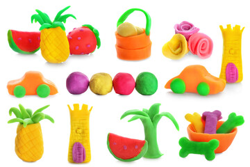 Collection of small figures made from play dough on white background