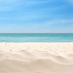 Fototapeta na wymiar Beautiful beach with white sand near ocean, closeup view