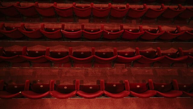 Empty theater opera house seats seen from above during Coronavirus, closed business concept affecting the arts and theatre due to Covid