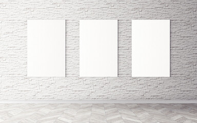 Empty white canvases on wall. Mockup for you design preview. Good use for advertising materials.