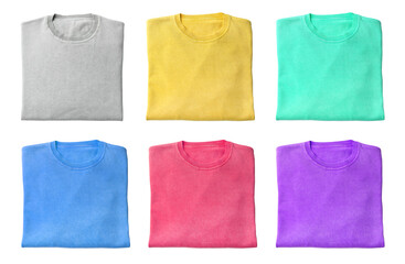 Set of folded warm sweaters on white background, top view