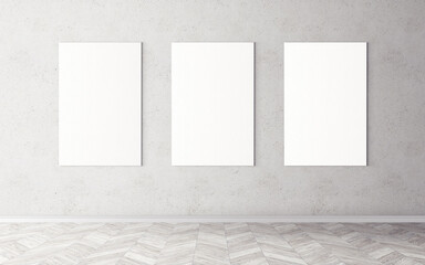 Empty white canvases on wall. Mockup for you design preview. Good use for advertising materials.