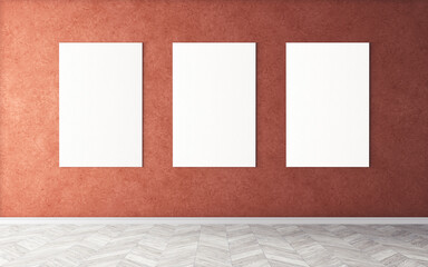 Three white empty canvases on wall. Mockup for you design preview. Good use for advertising materials.