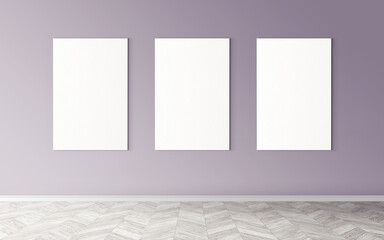 Three white empty canvases on wall. Mockup for you design preview. Good use for advertising...