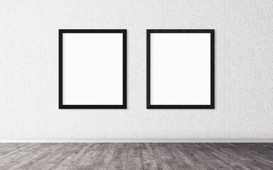 Two white posters with frame on wall. Mock up for you design preview. Good use for advertasing materials.