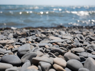 pebble beach. Sea stones in the summer sun