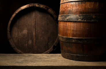 Old wooden barrel on a brown background