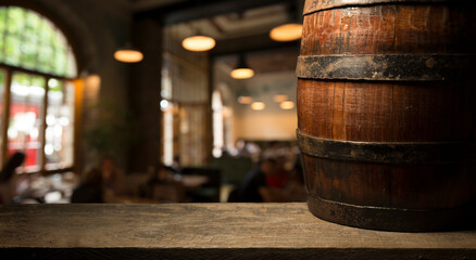 Old wooden barrel on a brown background