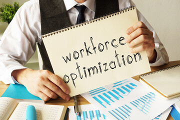 Workforce optimization is shown on the conceptual business photo