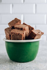 Raw vegan chocolate fudge. Healthy vegan food concept.