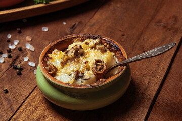  Julienne in a pot on a wooden rustic table