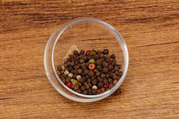 Peppercorn heap in the bowl
