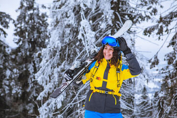 young gorgeous smiling woman with ski portrait