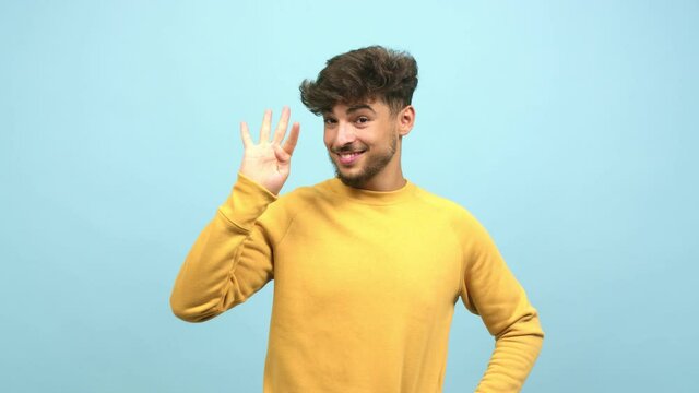Young arab man showing number four, symbol of counting, concept of mathematics, confident and cheerful