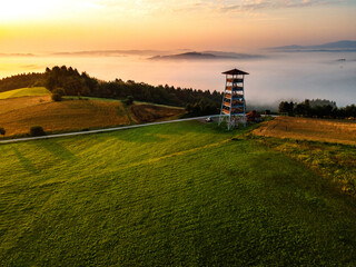 Lookout Tower in Brusnik,Poland and Stunning Countryside at Sunrise in Fog
