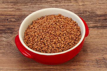 Raw buсkwheat cereal in the bowl