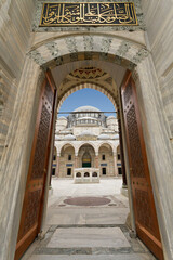 Suleymaniye Mosque through its gate, in Istanbul, Turkey.
